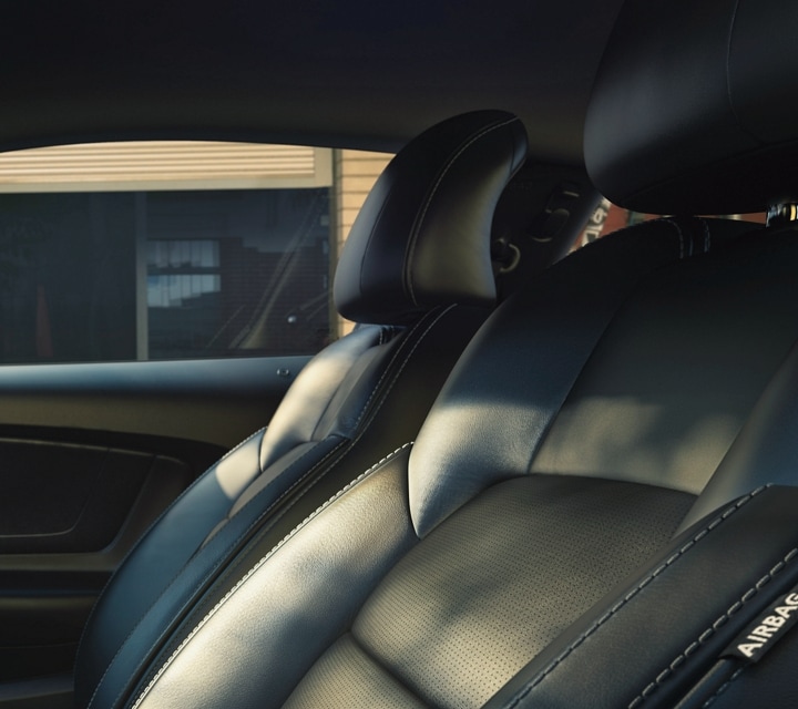 2021 Ford Mustang interior in ebony black with leather trimmed seats