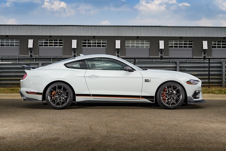 A 2023 Ford Mustang® Mach 1® model parked on a racetrack
