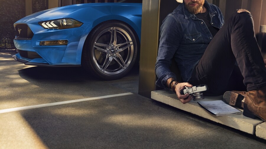19-inch Luster Nickel-painted forged-aluminum wheel with photographer in foreground