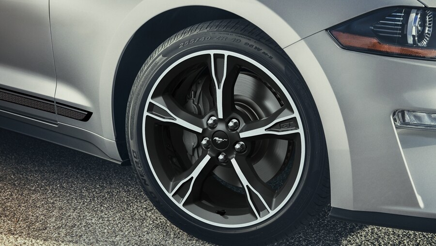 Close-up of 19-inch by 8.5-inch machined-face aluminum Carbonized Grey-painted wheel