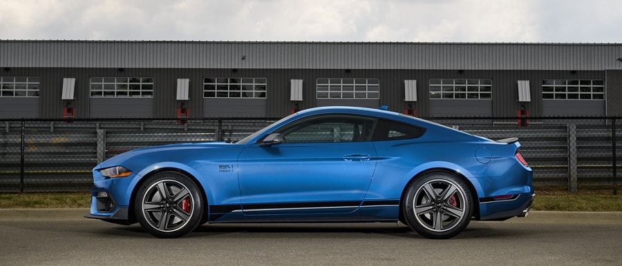 A 2023 Ford Mustang® Mach 1® model parked on a racetrack