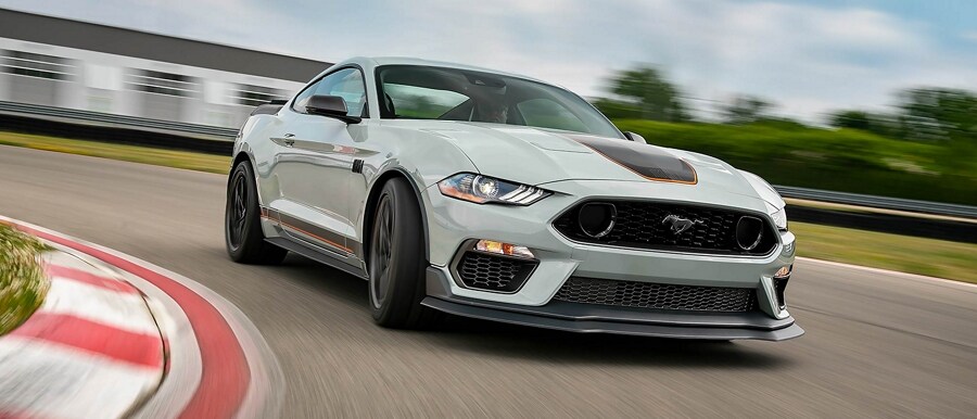 A 2023 Ford Mustang® Mach 1® coupe being driven on a closed course