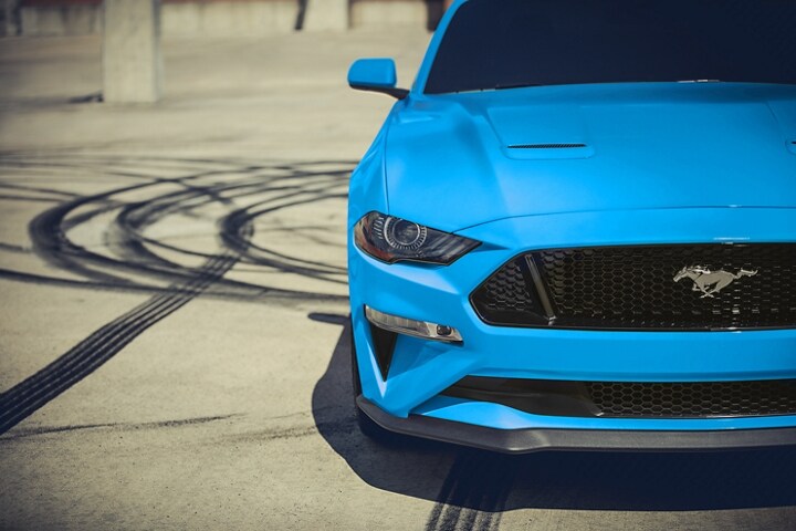 2023 Ford Mustang® coupe parked with burnout marks in the background