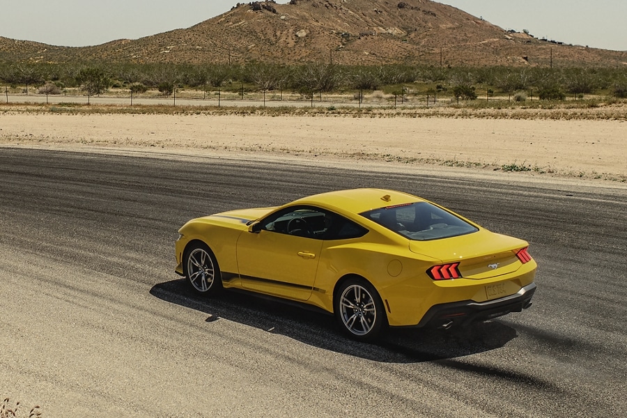 2024 Ford Mustang® EcoBoost® coupe being driven on a desert road