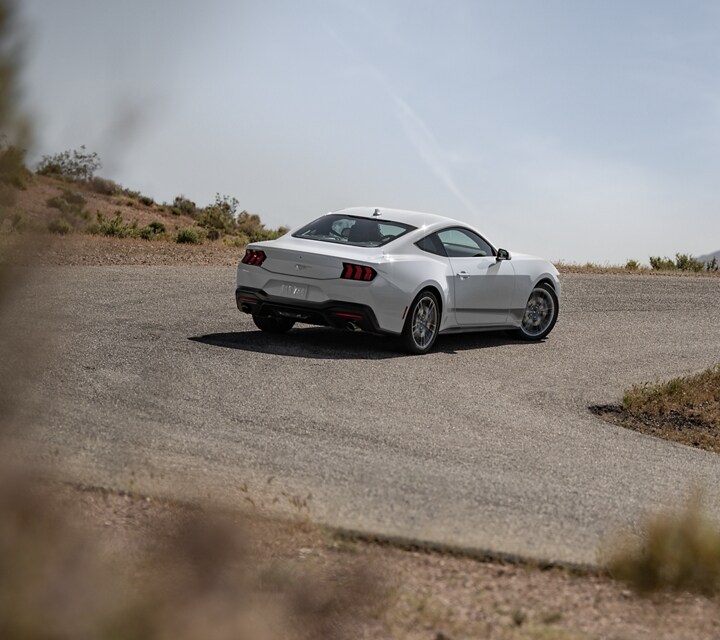 2024 Ford Mustang® EcoBoost® coupe being driven on a desert road