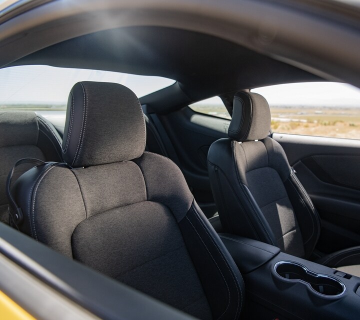 2024 Ford Mustang® front seats shown through the passenger-side window