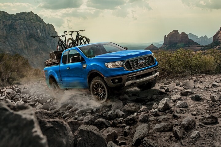 2023 Ford Ranger® in Velocity Blue being driven up a rocky trail