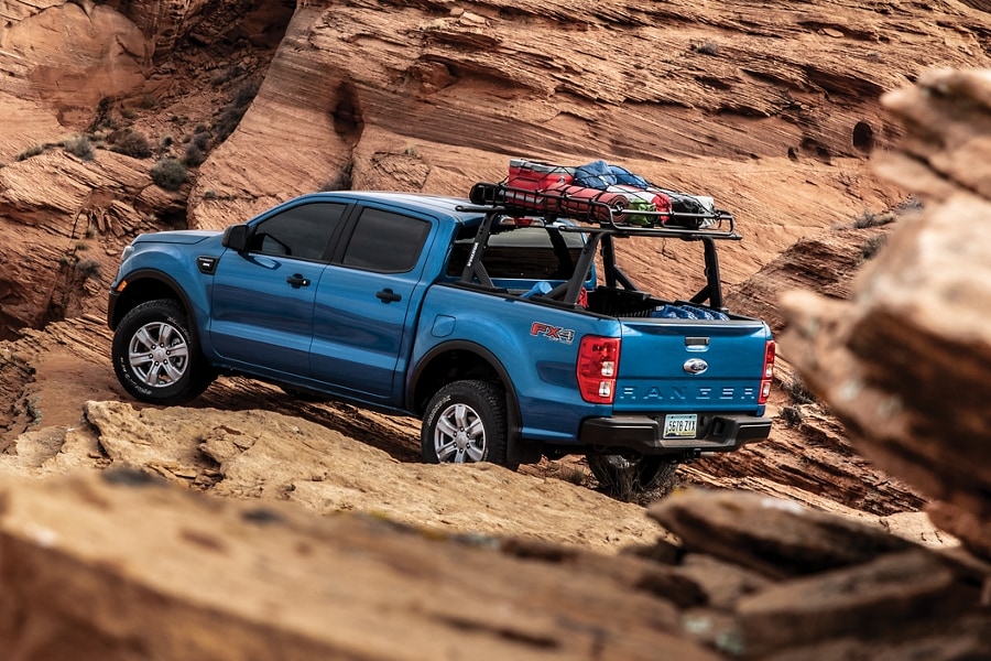 2023 Ford Ranger® in Velocity Blue being driven in a canyon