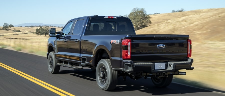 2023 Ford Super Duty® F-250 XL with STX Appearance Package being driven on a scenic road