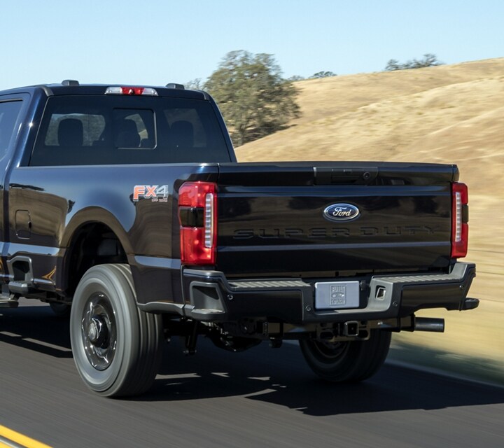 Close-up of a 2023 Ford Super Duty® XL tailgate in Antimatter Blue