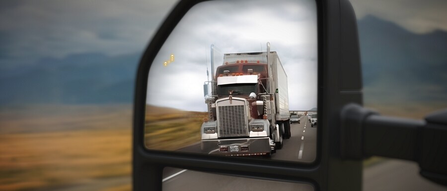 Close-up of the centre display screen showing the turn signal camera view