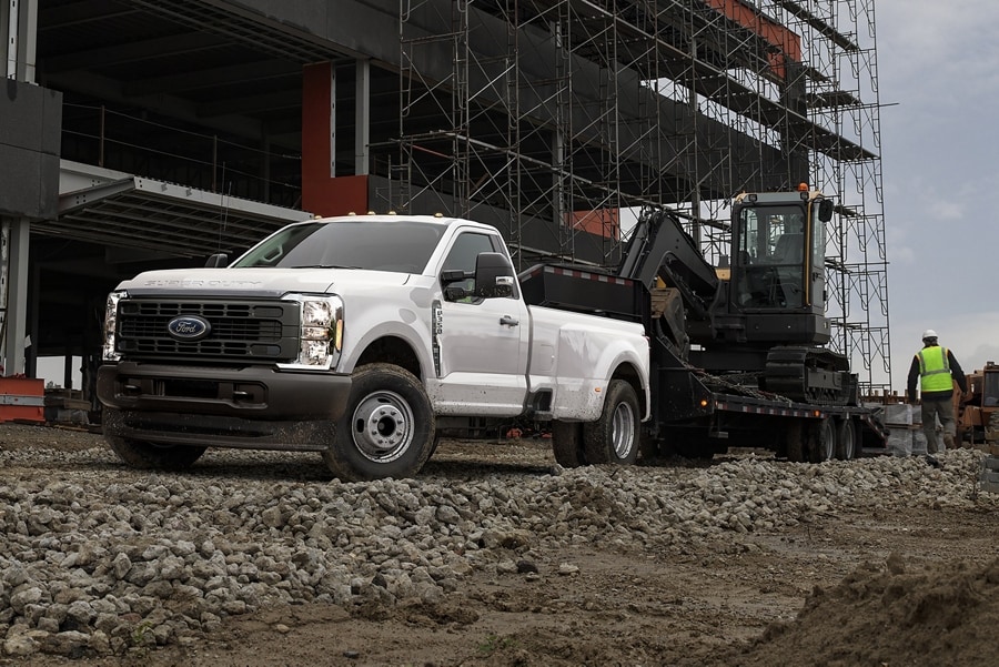 2025 Ford Super Duty® F-350® XL DRW model in Oxford White parked at a construction site