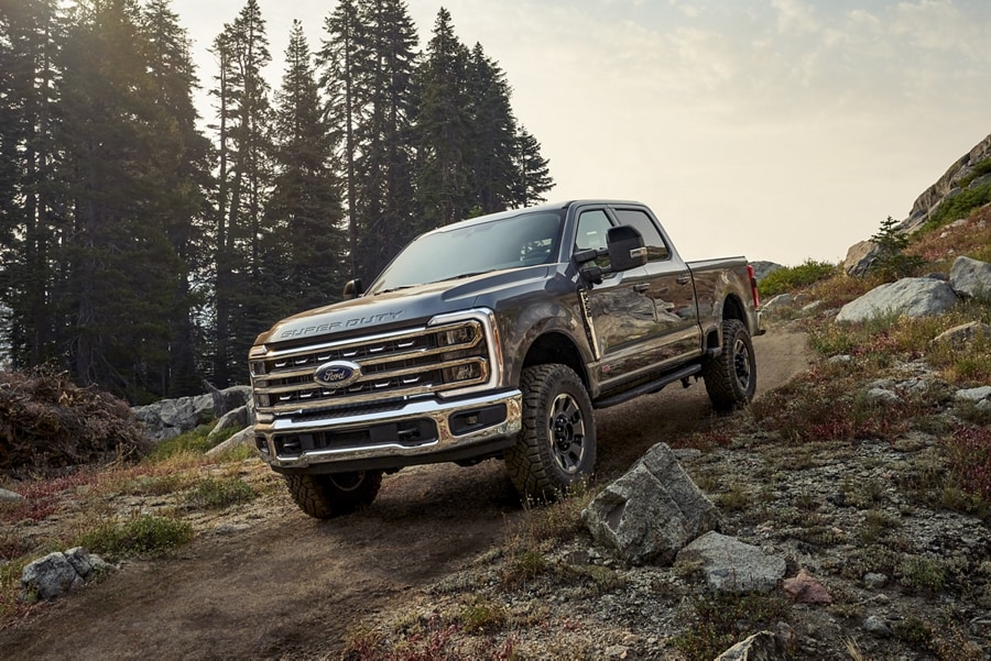 2025 Ford Super Duty® F-250® TREMOR® model being driven on a rocky path
