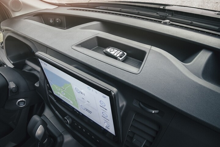 Close-up of a 2023 Ford Transit® CC-CA dash featuring a key fob