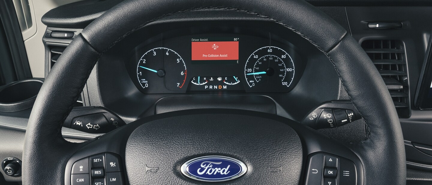 Close-up of the steering wheel in a 2023 Ford Transit® Van