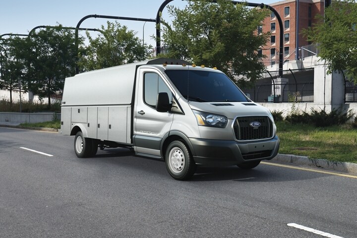 2024 Ford Transit® Chassis Cab model with mechanic's truck upfit being driven down a road