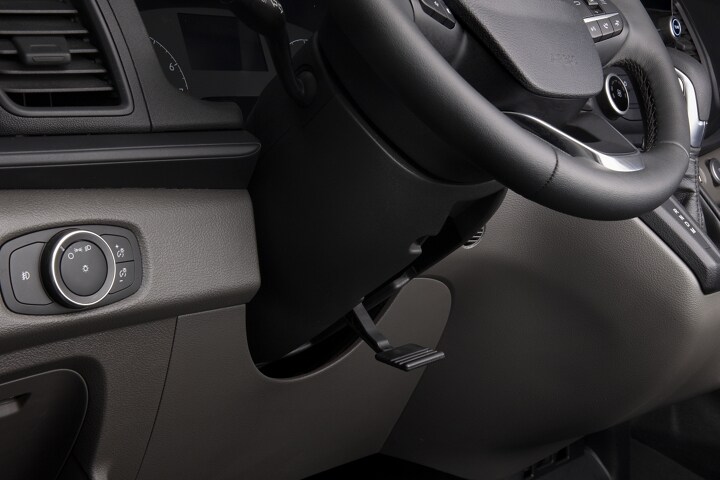 Close-up of the tilt and telescoping steering column on the steering wheel