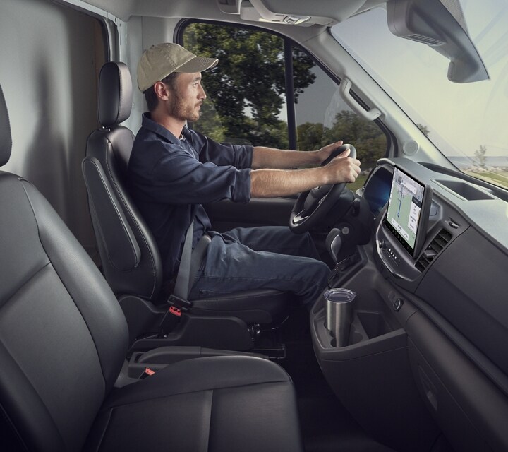 Person driving a 2024 Ford Transit® Cutaway model