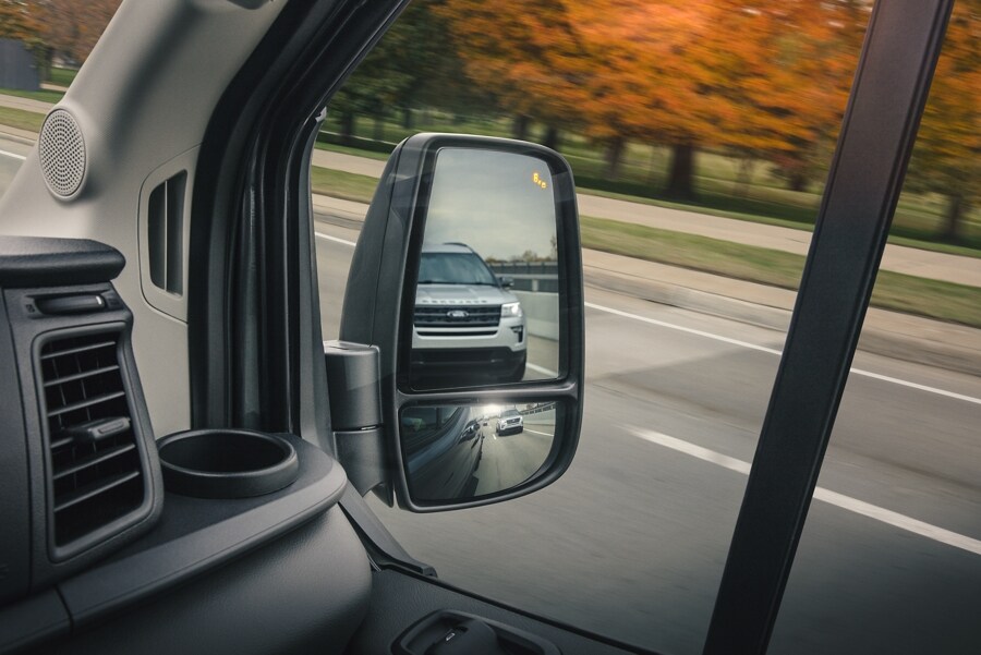 2024 Ford Transit® model passenger-side mirror showing the Blind Spot Assist