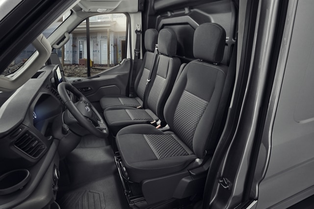 The interior of a 2023 Ford Transit® Van with a 3-passenger front seat