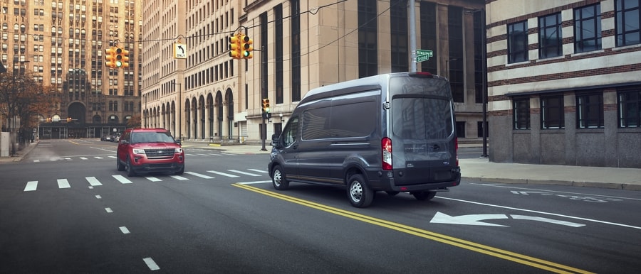 2023 Ford Transit® Cargo Van stopped on a city street