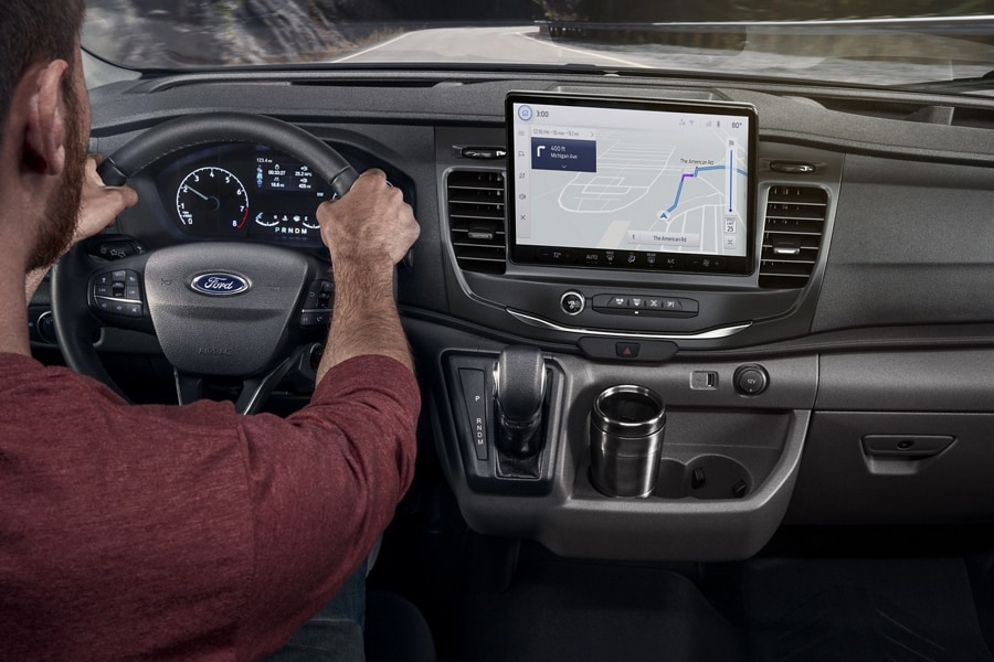 Interior of a 2024 Ford Transit® Van showing the touchscreen and dashboard