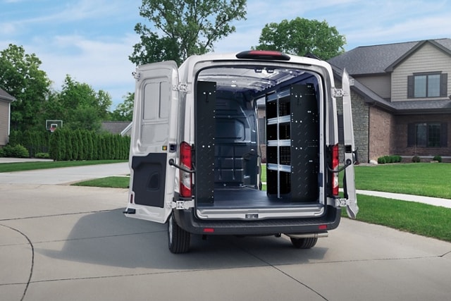 An open 2024 Ford Transit® van showing shelves