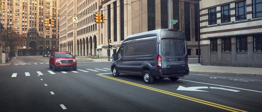 A 2024 Ford Transit® van in an urban environment