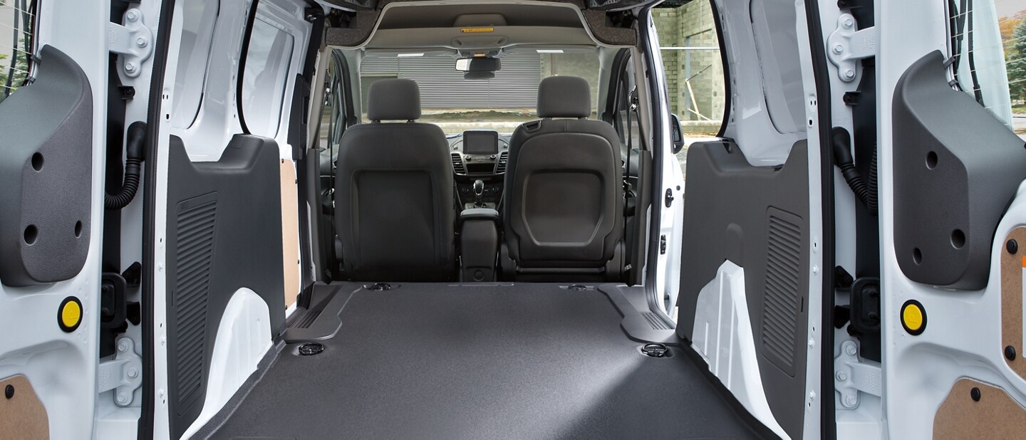 Interior of 2023 Ford Transit Connect Cargo Van showing ample wheel well width