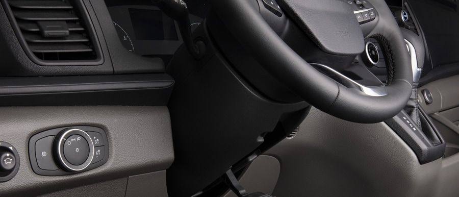 Shot of the tilt/telescoping steering wheel inside a 2023 Ford Transit® van