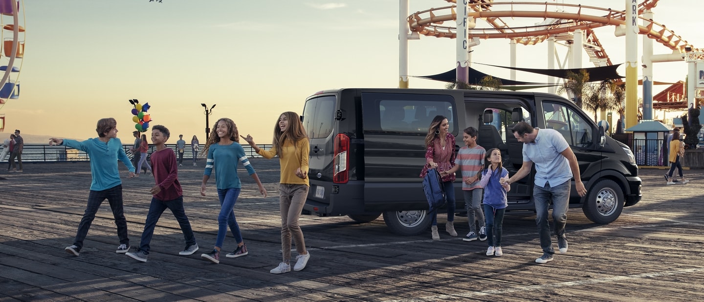 A family exiting a 2023 Ford Transit® van
