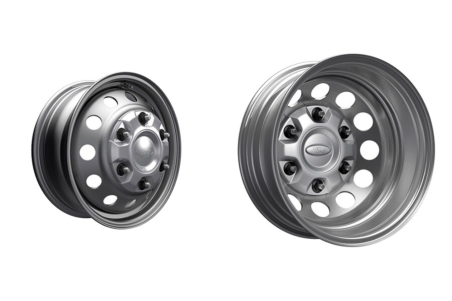 Shot of two 16" heavy-duty silver steel wheels with exposed lug nuts